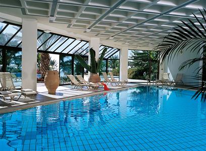 фото отеля Constantinou Bros Athena Beach Hotel