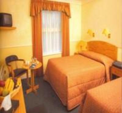 фото отеля Flynns Shannon Key West Hotel Rooskey