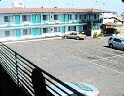 фото отеля Travelers Beach Inn