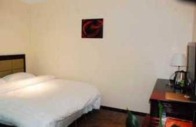 фото отеля Xinlong Business Hotel