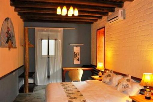 фото отеля Yangshuo Secret Garden Boutique Hotel