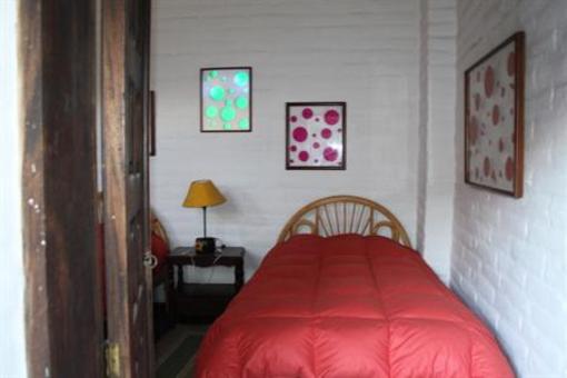 фото отеля Hostal Casa del Quinde