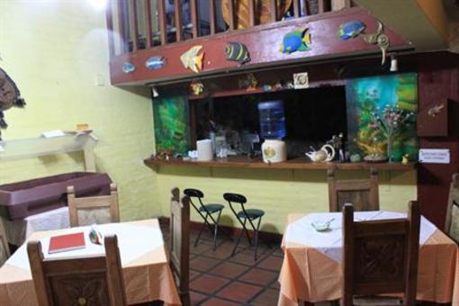 фото отеля Hostal Casa del Quinde