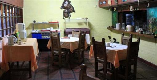 фото отеля Hostal Casa del Quinde