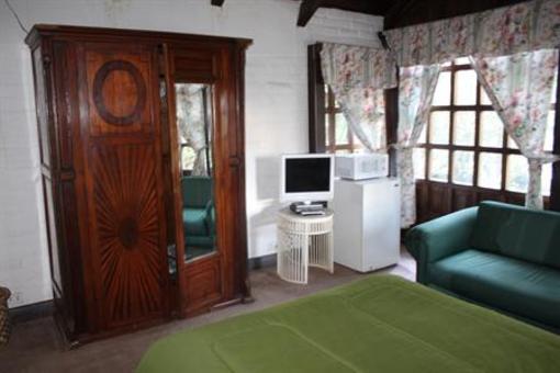 фото отеля Hostal Casa del Quinde