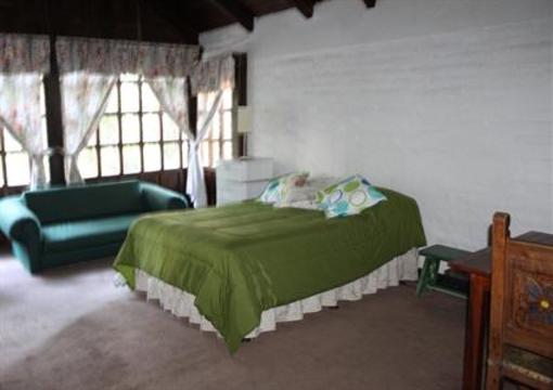 фото отеля Hostal Casa del Quinde