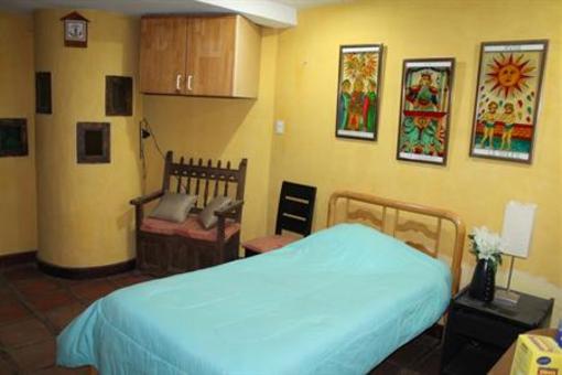 фото отеля Hostal Casa del Quinde