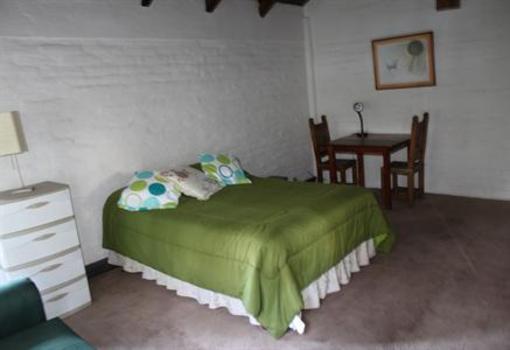 фото отеля Hostal Casa del Quinde