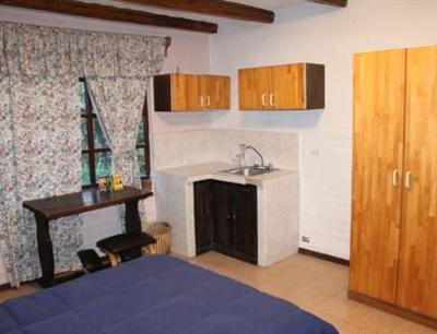 фото отеля Hostal Casa del Quinde
