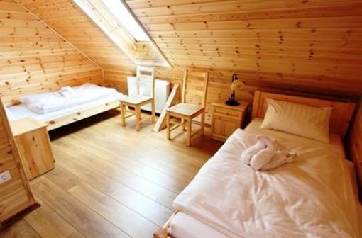 фото отеля Family Panzio Es Apartman Hazak