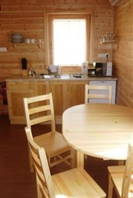 фото отеля Family Panzio Es Apartman Hazak