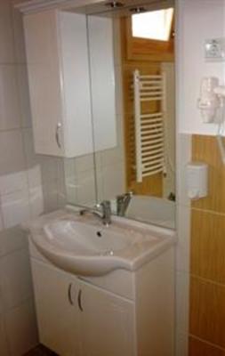 фото отеля Family Panzio Es Apartman Hazak