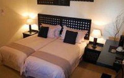фото отеля Bar-t-Nique Guest House