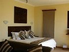 фото отеля Bar-t-Nique Guest House