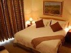 фото отеля Bar-t-Nique Guest House