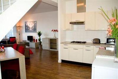 фото отеля Damrak Apartments