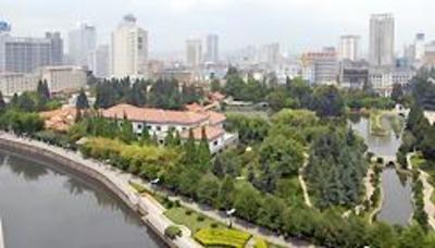фото отеля Yunnan Zhenzhuang Guest House