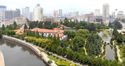 фото отеля Yunnan Zhenzhuang Guest House