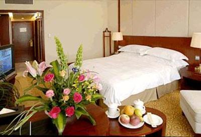 фото отеля Yunnan Zhenzhuang Guest House