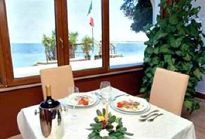 фото отеля Azzolini Palm Beach Hotel