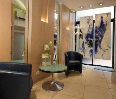 фото отеля Hotel Ours Blanc Place Victor Hugo