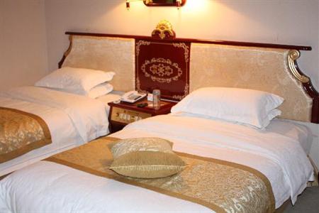 фото отеля Jiuzhaigou Xingyu Grand Hotel