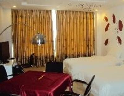 фото отеля Kaili Tianyu Sunshine Hotel