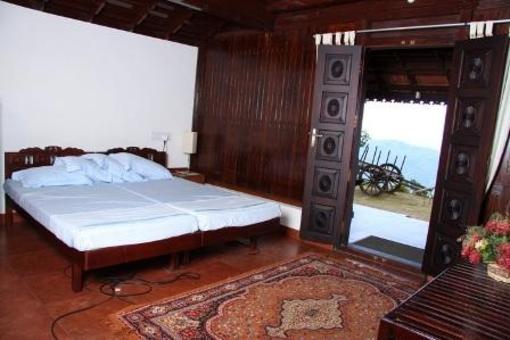 фото отеля Kollenkeril Plantation Home Stay Bunaglow
