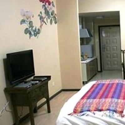 фото отеля Saga Inn Jinbi Apartment Kunming