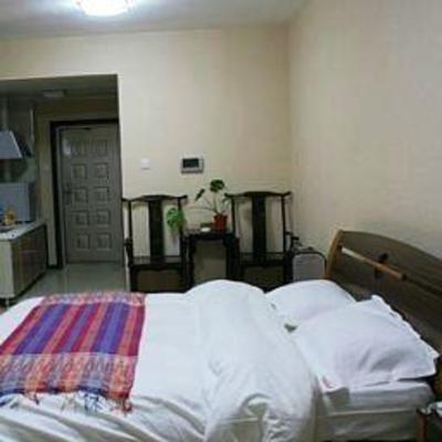 фото отеля Saga Inn Jinbi Apartment Kunming