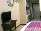 фото отеля Saga Inn Jinbi Apartment Kunming