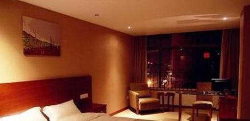 фото отеля Super 8 Quanzhou Xinchezhan