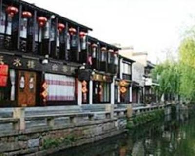 фото отеля Zhouzhuang Jinshuiloutai Inn