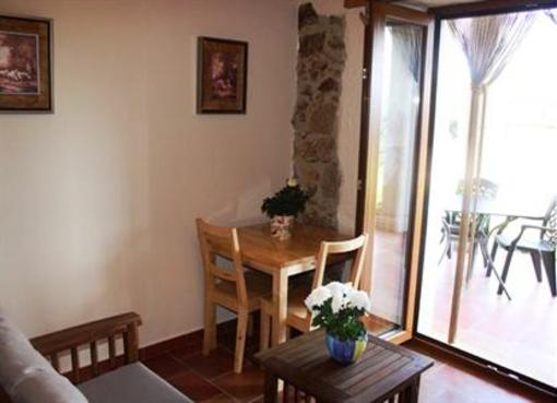 фото отеля Apartamentos El Jardin del Poeta