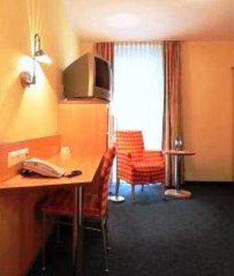 фото отеля Hotel Beim Schrey Kirchheim bei Munchen