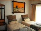 фото отеля Huppelepup Guesthouse Hartbeespoort