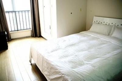фото отеля Yuehong Apartment Hotel