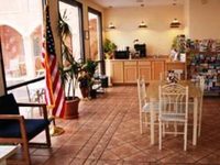 Budget Host Four Winds Motor Lodge