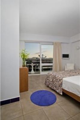 фото отеля Es Mitjorn Hotel Ibiza
