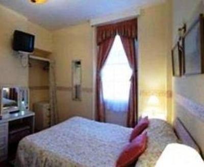 фото отеля Beachcomber Guest House