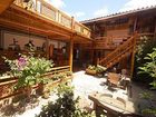 фото отеля Mu Jia Garden Inn Lijiang