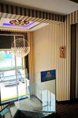 фото отеля Shell Inn Group Mudanjiang Guangsha