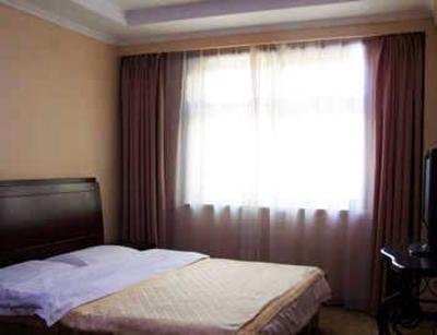 фото отеля Zhuhui Business Hotel