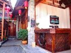 фото отеля Lijiang Jiuwei Life Courtyard Inn