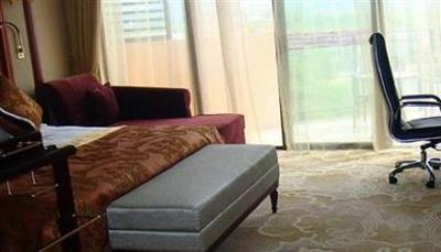 фото отеля Jing Cheng Earthsea Spa Holiday Center Ruili