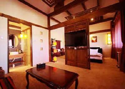 фото отеля Lijiang Yunjin Yaju Courtyard Hotel