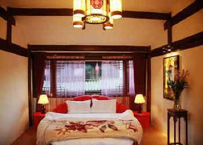 фото отеля Lijiang Yunjin Yaju Courtyard Hotel