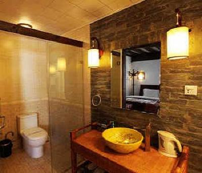 фото отеля Lijiang Yunjin Yaju Courtyard Hotel