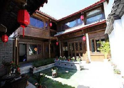 фото отеля Lijiang Yunjin Yaju Courtyard Hotel