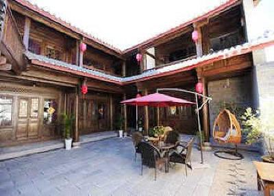 фото отеля Lijiang Yunjin Yaju Courtyard Hotel